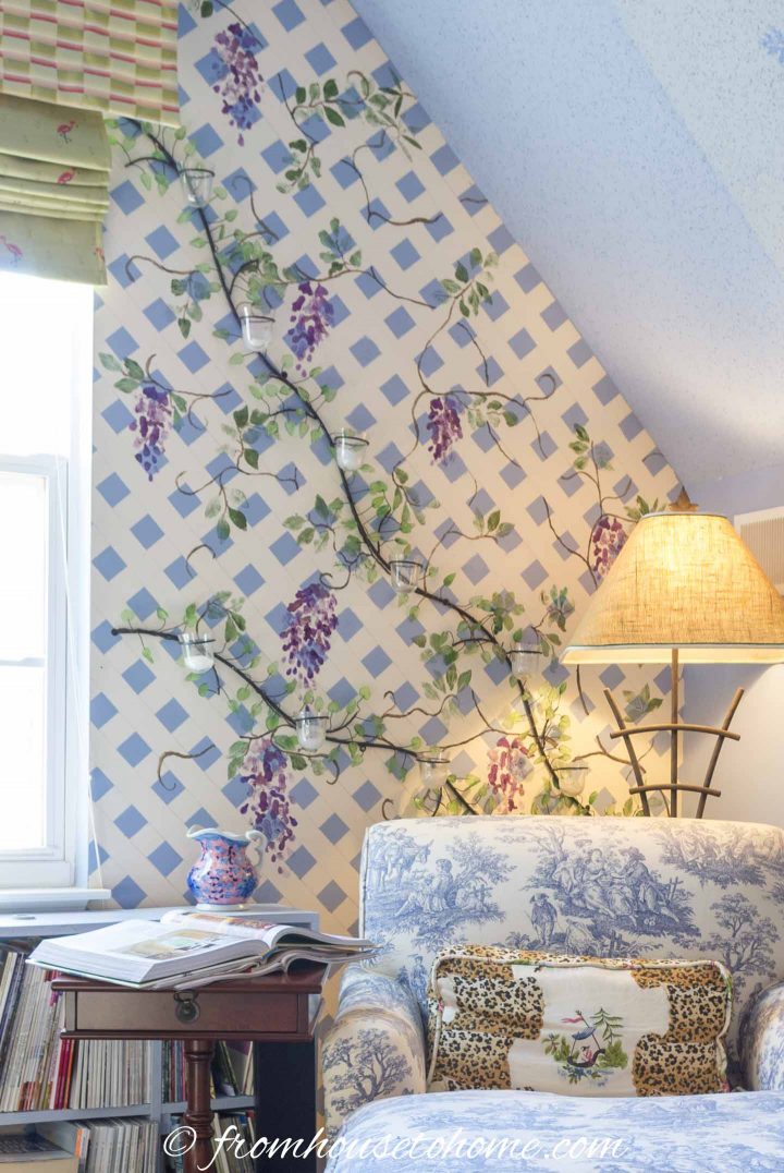 Bonus room wall painted with a stenciled wisteria on a trellis