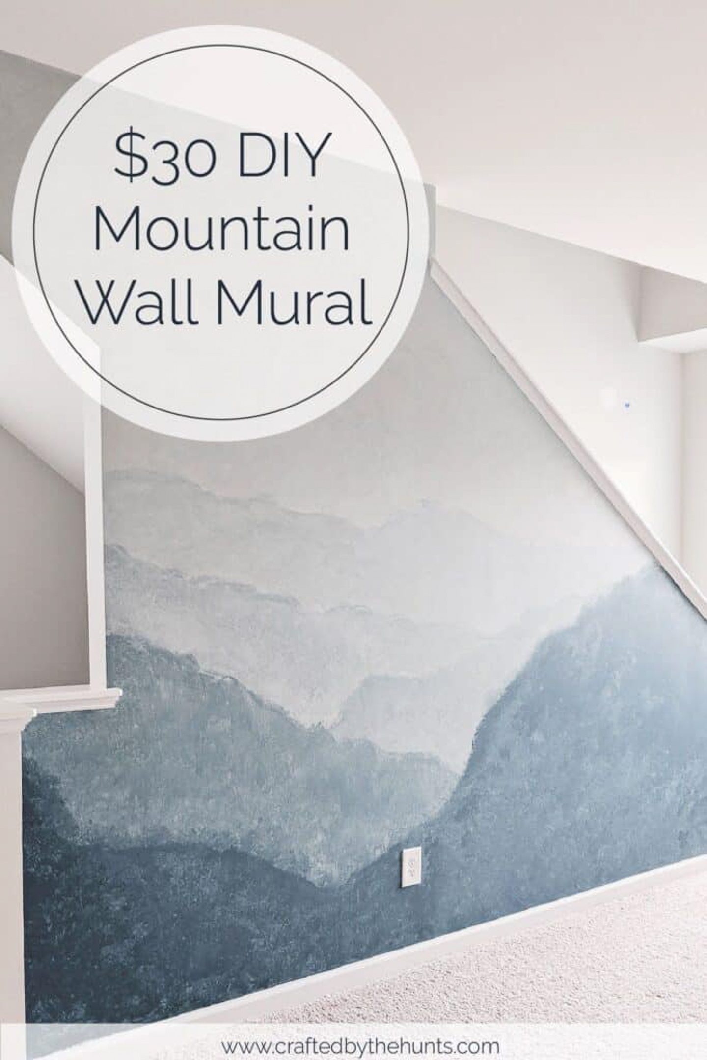 Wall with a painted mountain mural via craftedbythehunts.com
