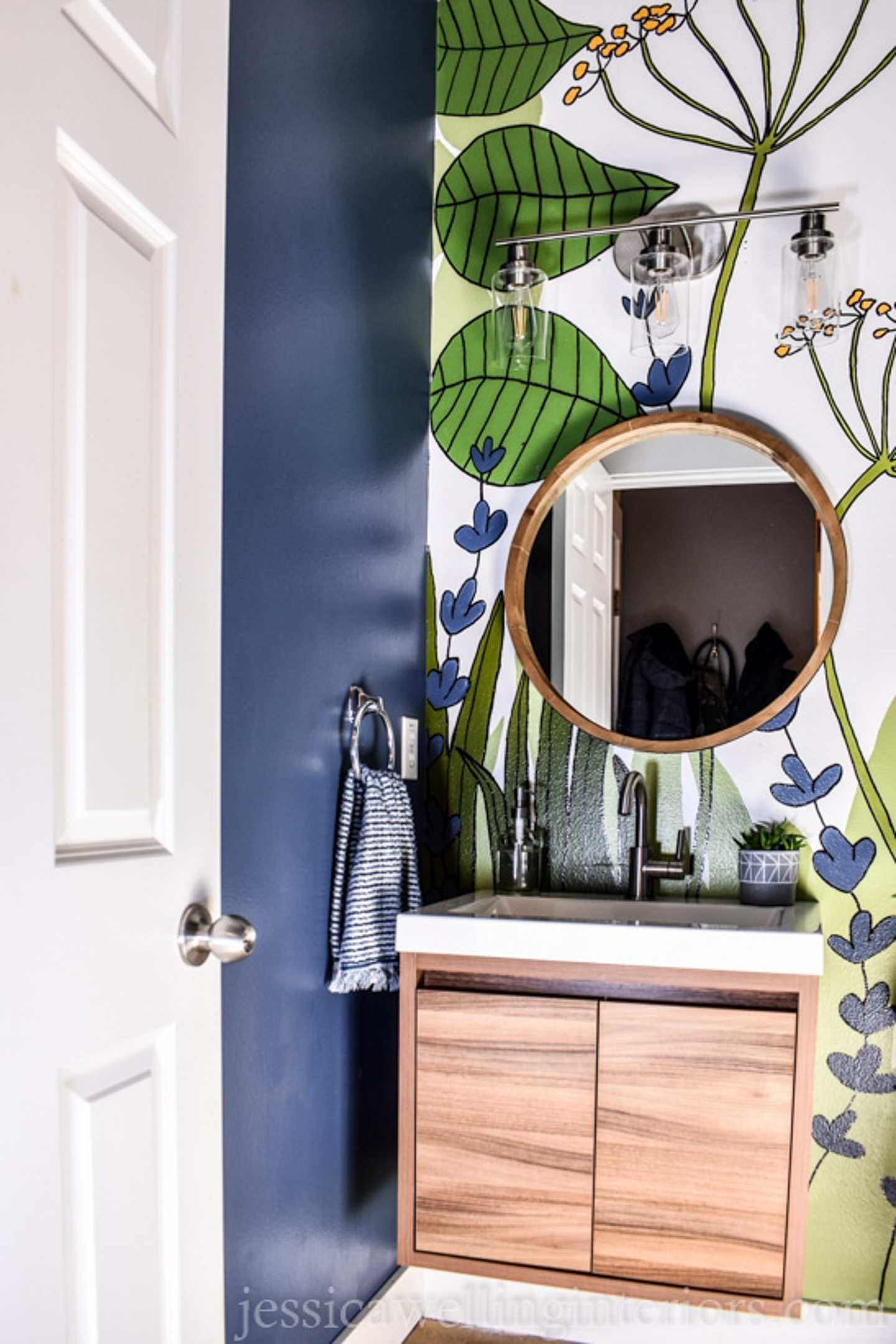 Bathroom wall hand painted with a large botanical mural via jessicawellinginteriors