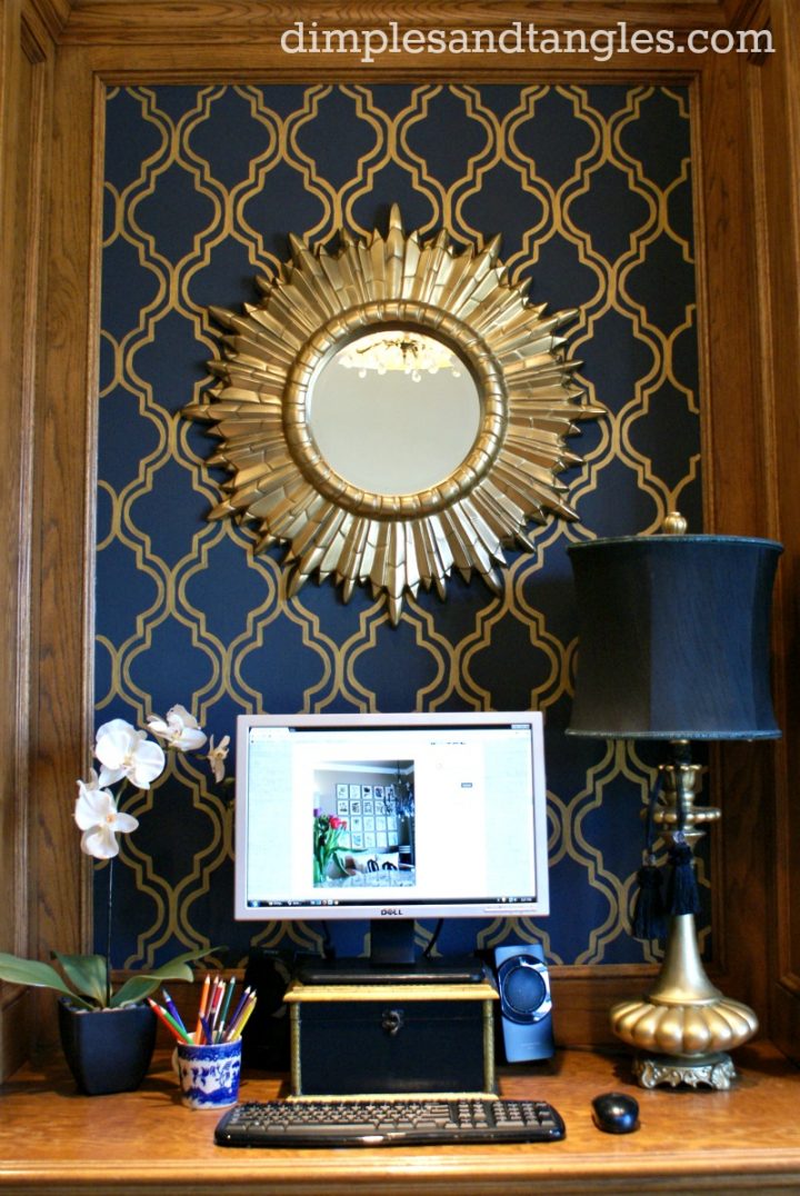 Blue and gold stenciled wall via dimplesandtangles.com