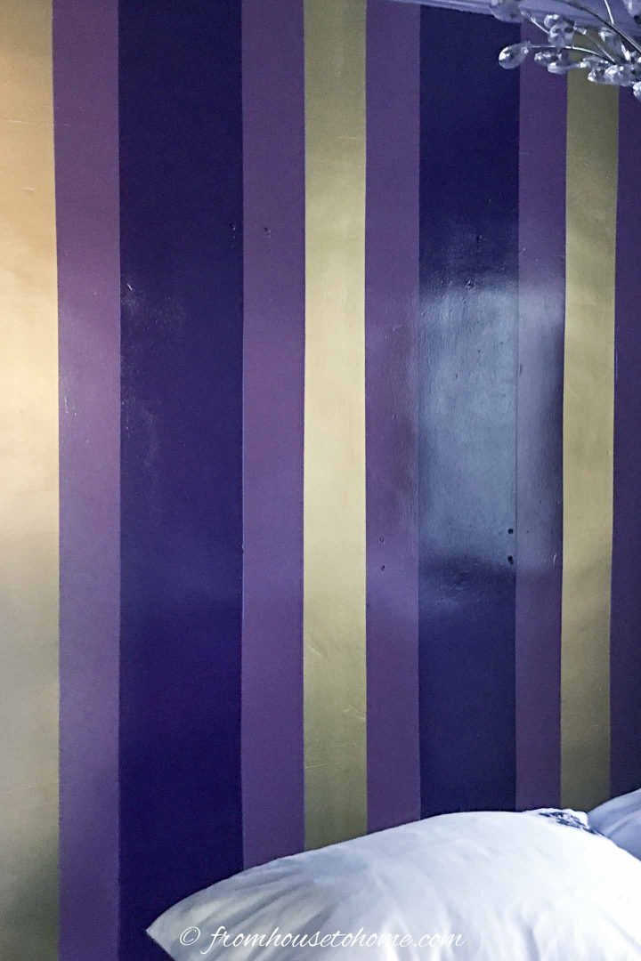 The painted vertical stripes on the wall