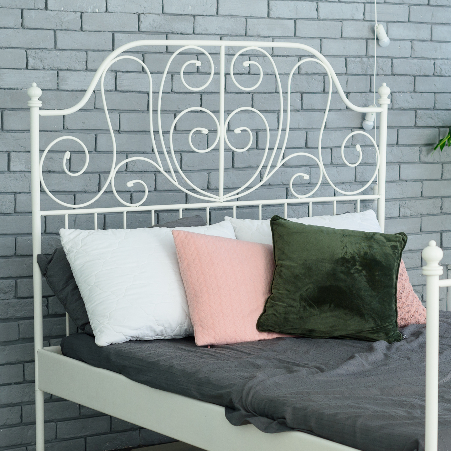 Bed with white metal bed frame