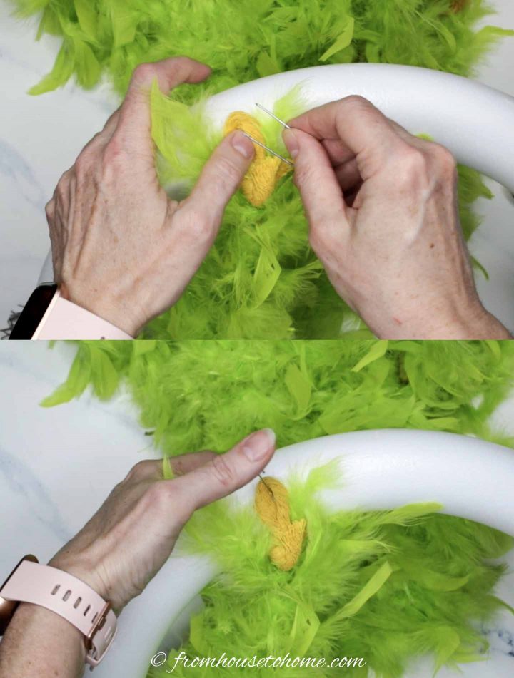 How to attach the green feather boa to a styrofoam wreath form