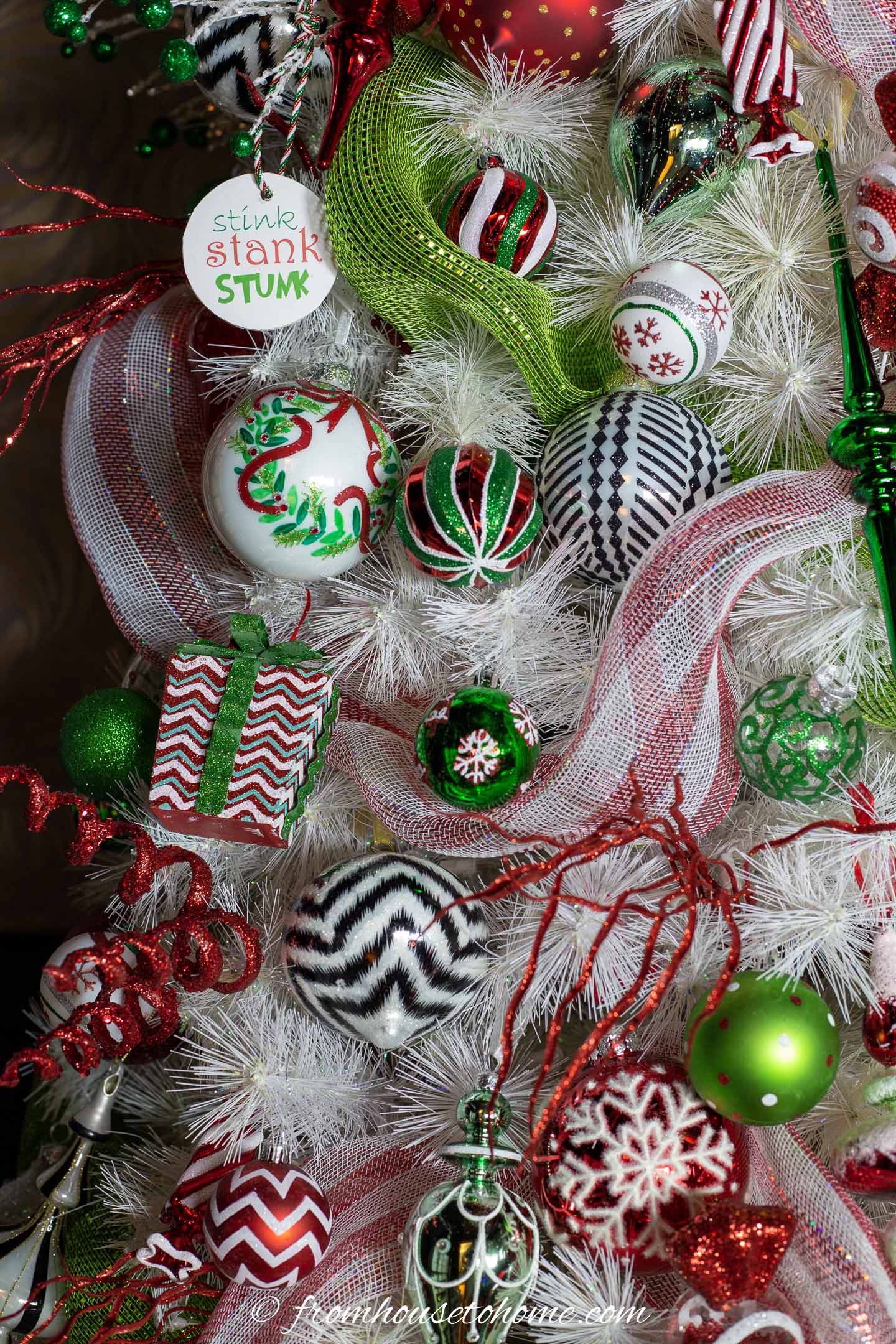 Close up of the ornaments on the Grinch Christmas tree