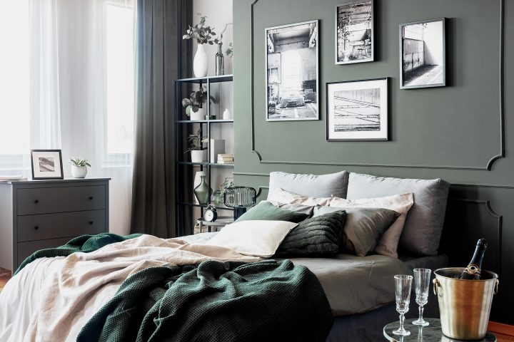 Bedroom painted in moss green paint color