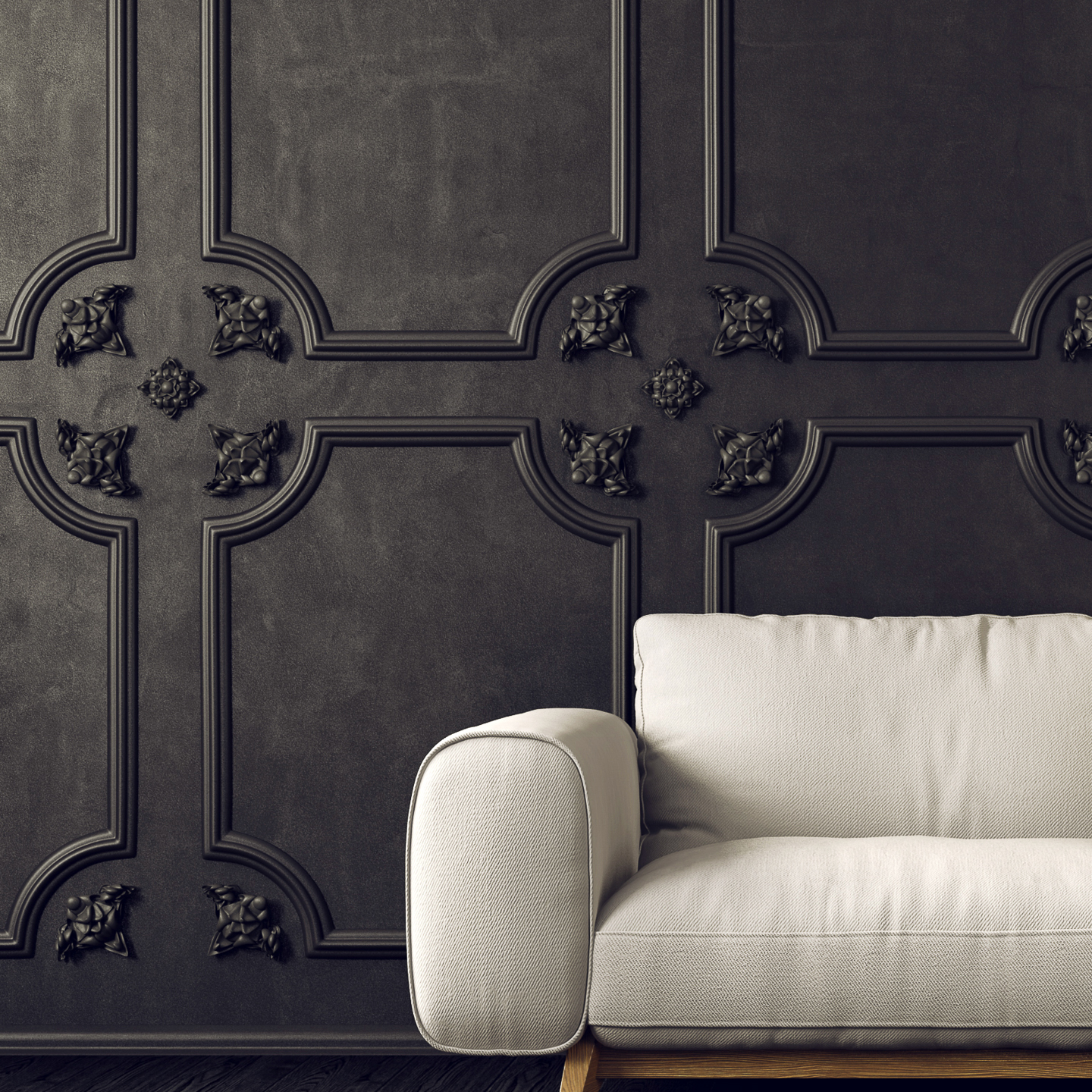 Black walls with panel moldings and a white sofa