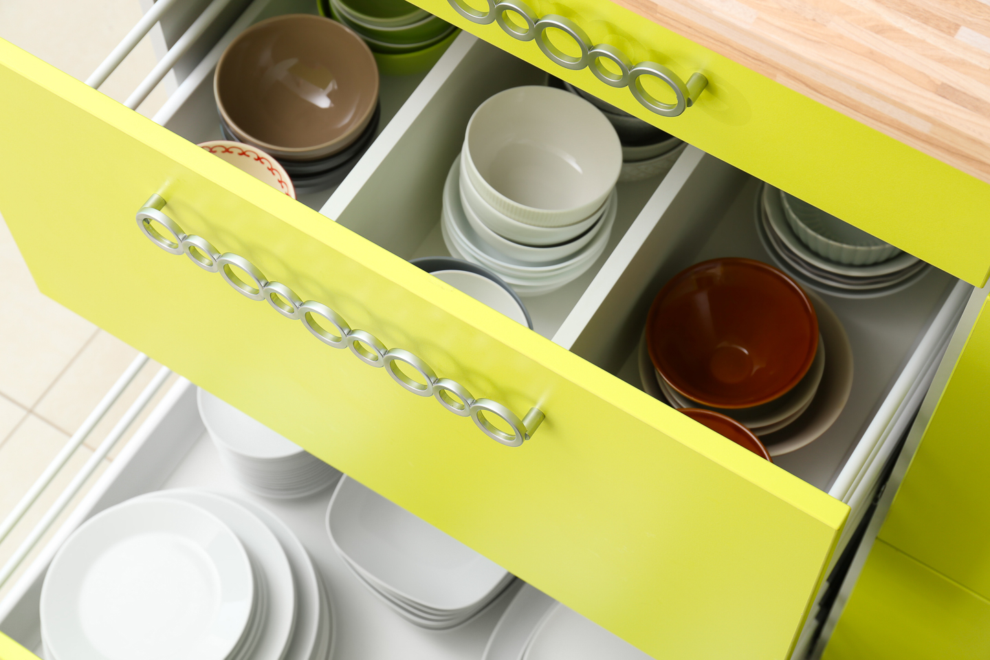 Base cabinet drawers organized for dishes ©Africa Studio - stock.adobe.com
