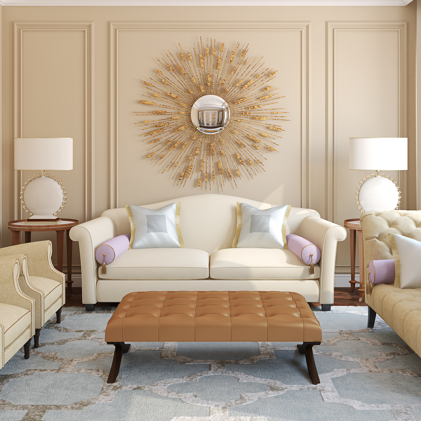 A beige living room with a white sofa, pastel pillows, two lamps on round tables, a tan ottoman, and a gold sunburst mirror on the wall.