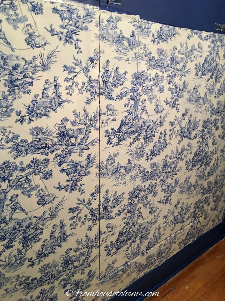 a wall covered with fabric that was hung with starch