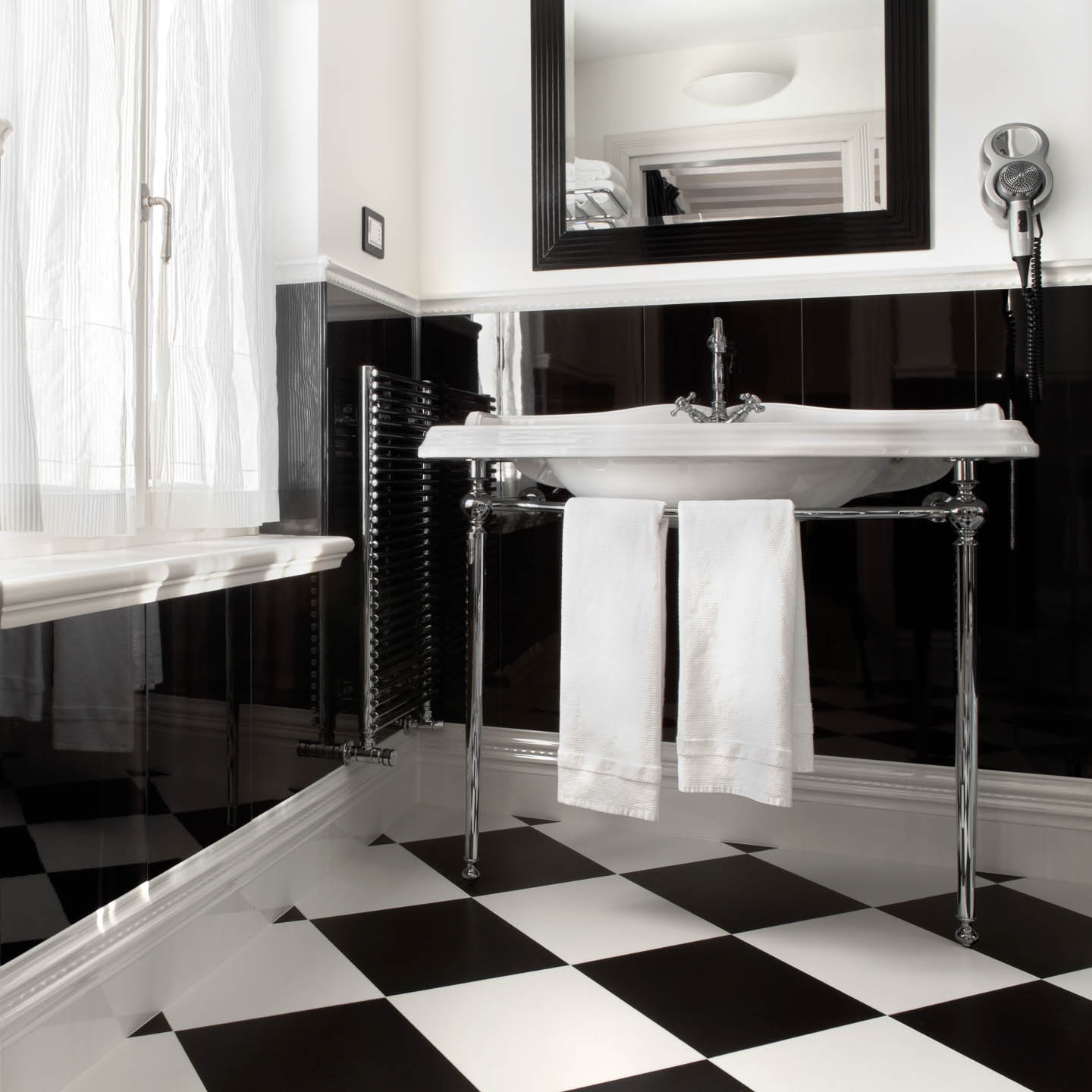 Retro bathroom with checkered black and white floor tiles
