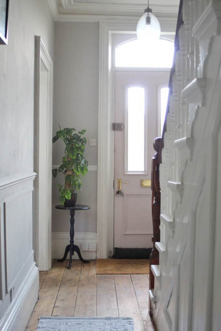 Hallway painted in Cornforth White with a door painted in Calamine (©lifewithholly.co.uk)
