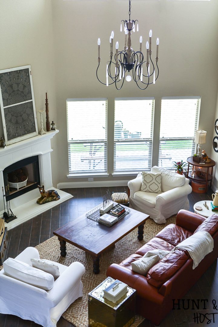 Neutral living room with walls painted in Sherwin Williams Accessible Beige (©salvagedliving.com)