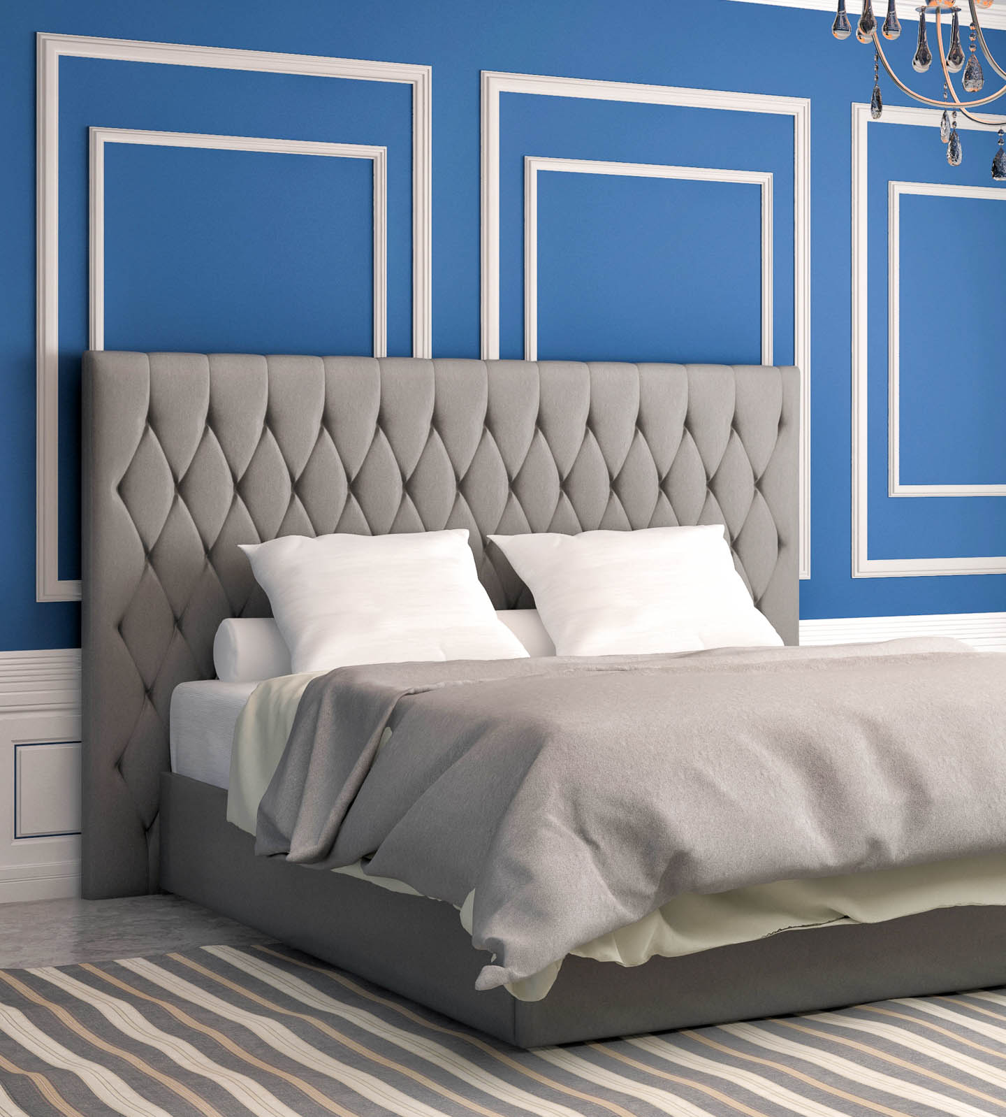 Bedroom with royal blue walls, white wainscoting and a gray bed and rug