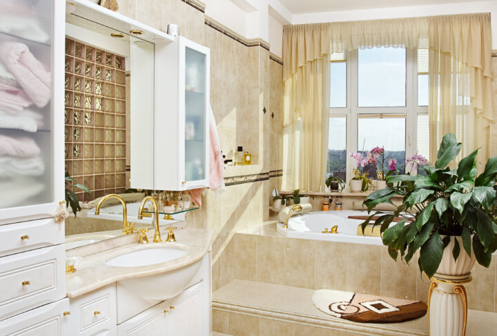80's style bathroom with brassy gold fixtures