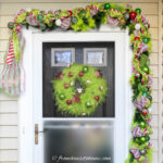 DIY Grinch garland over a front door