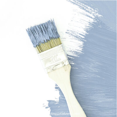 paint brush with grey blue paint