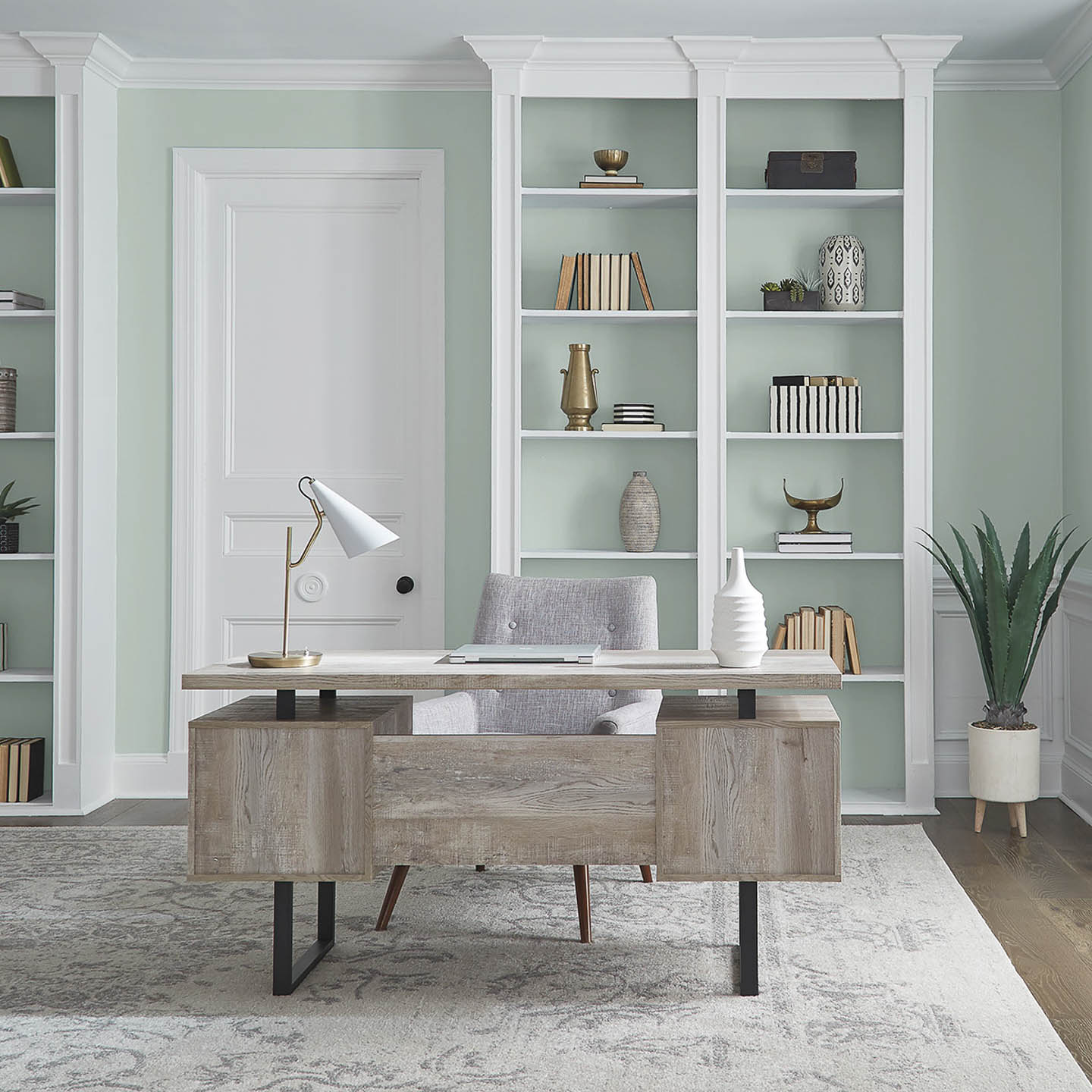 An office painted in Behr's 2022 color of the year 'Breezeway'