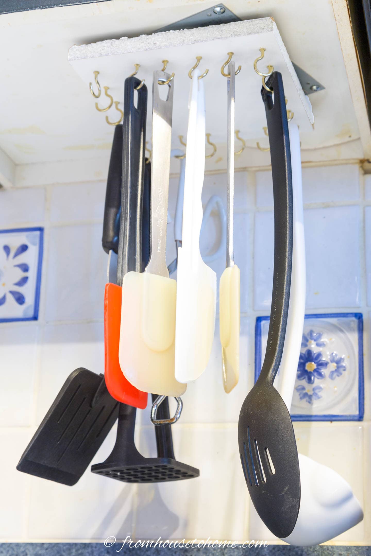 DIY under cabinet storage rack for hanging kitchen utensils
