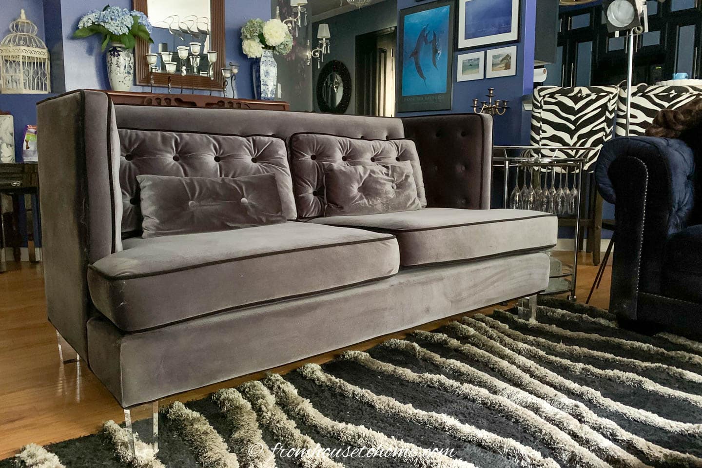 grey living room sofa with acrylic legs