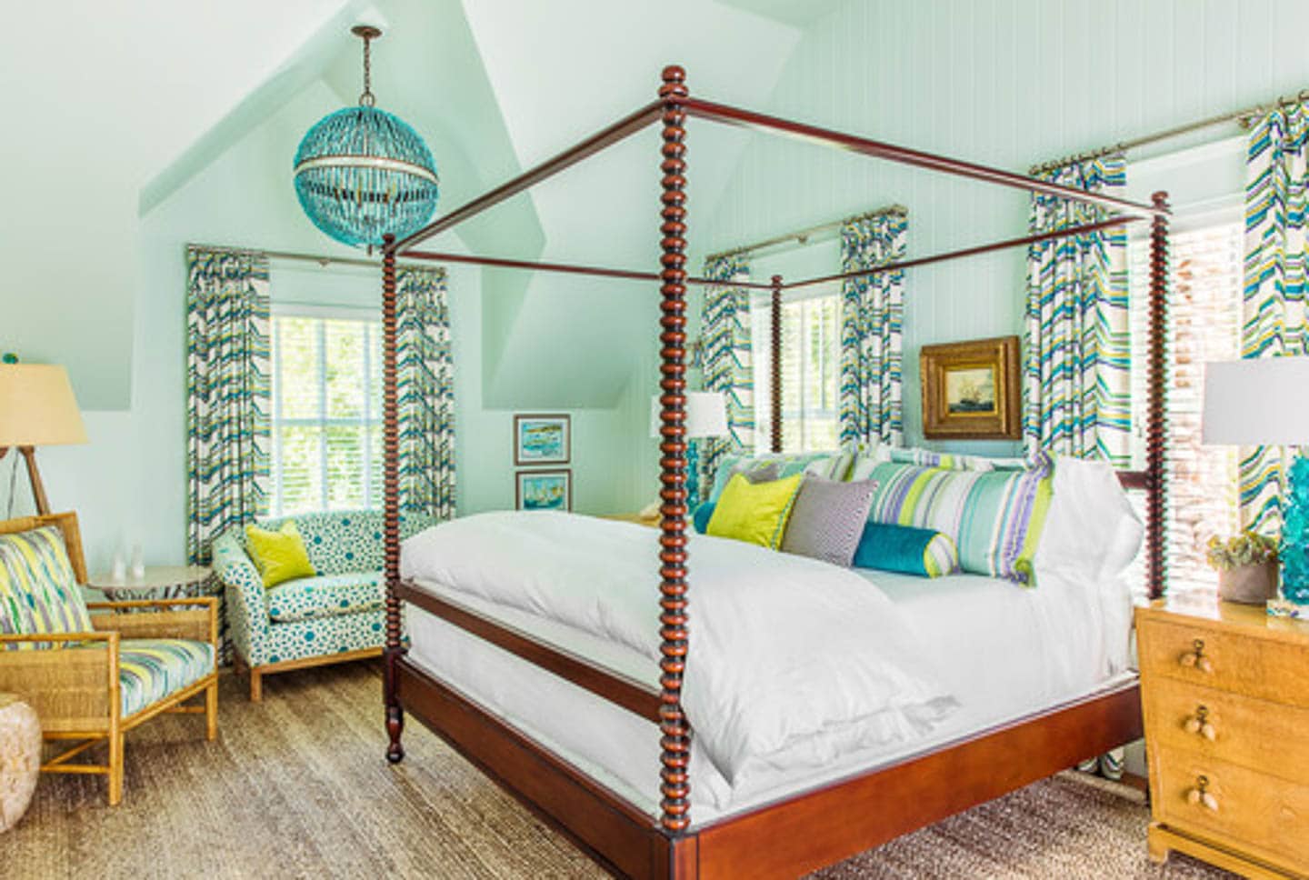 Beach style bedroom with light greeen walls and ceiling