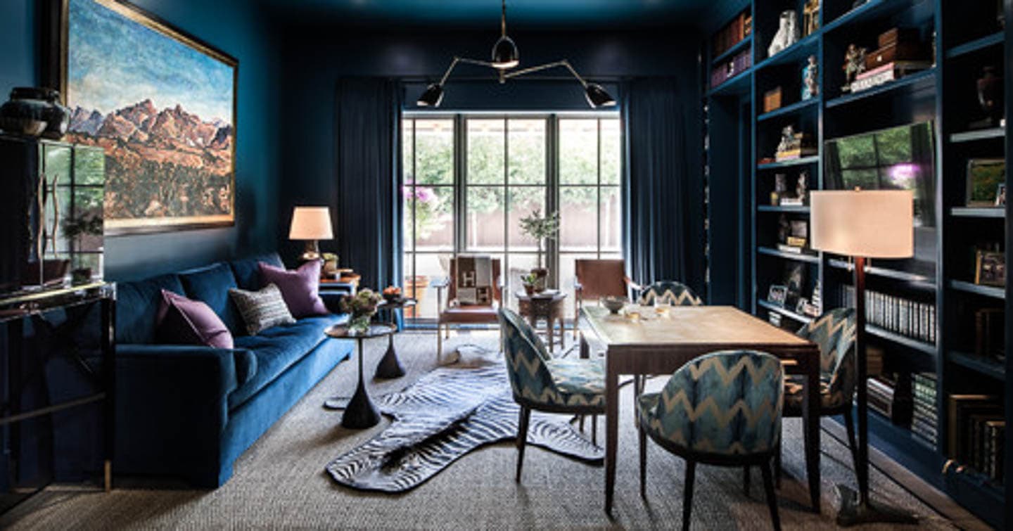 Living room walls, ceiling and trim painted in dark blue