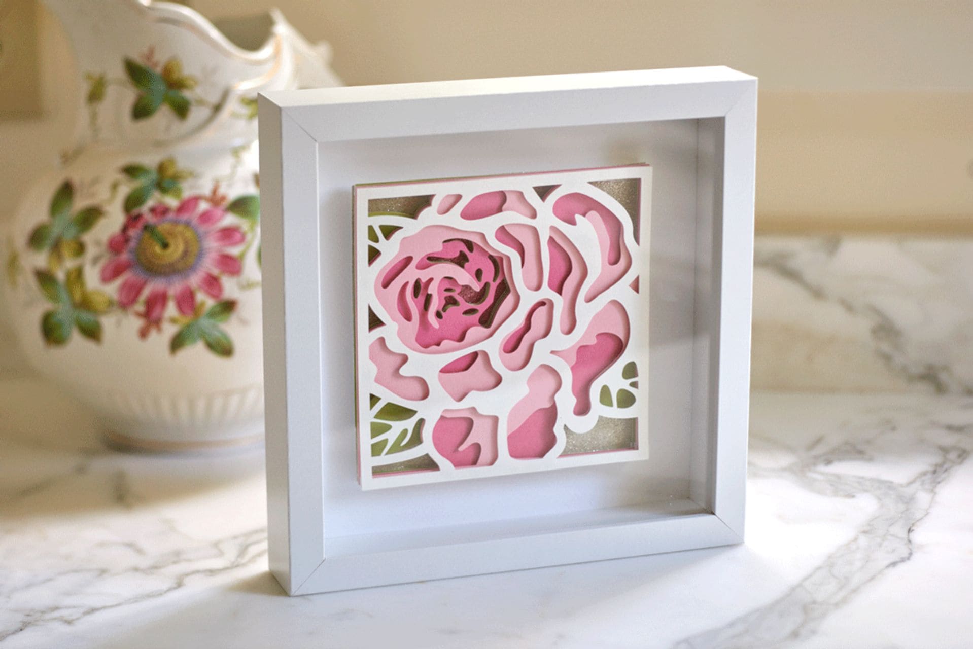 Framed rose picture made from layers of paper