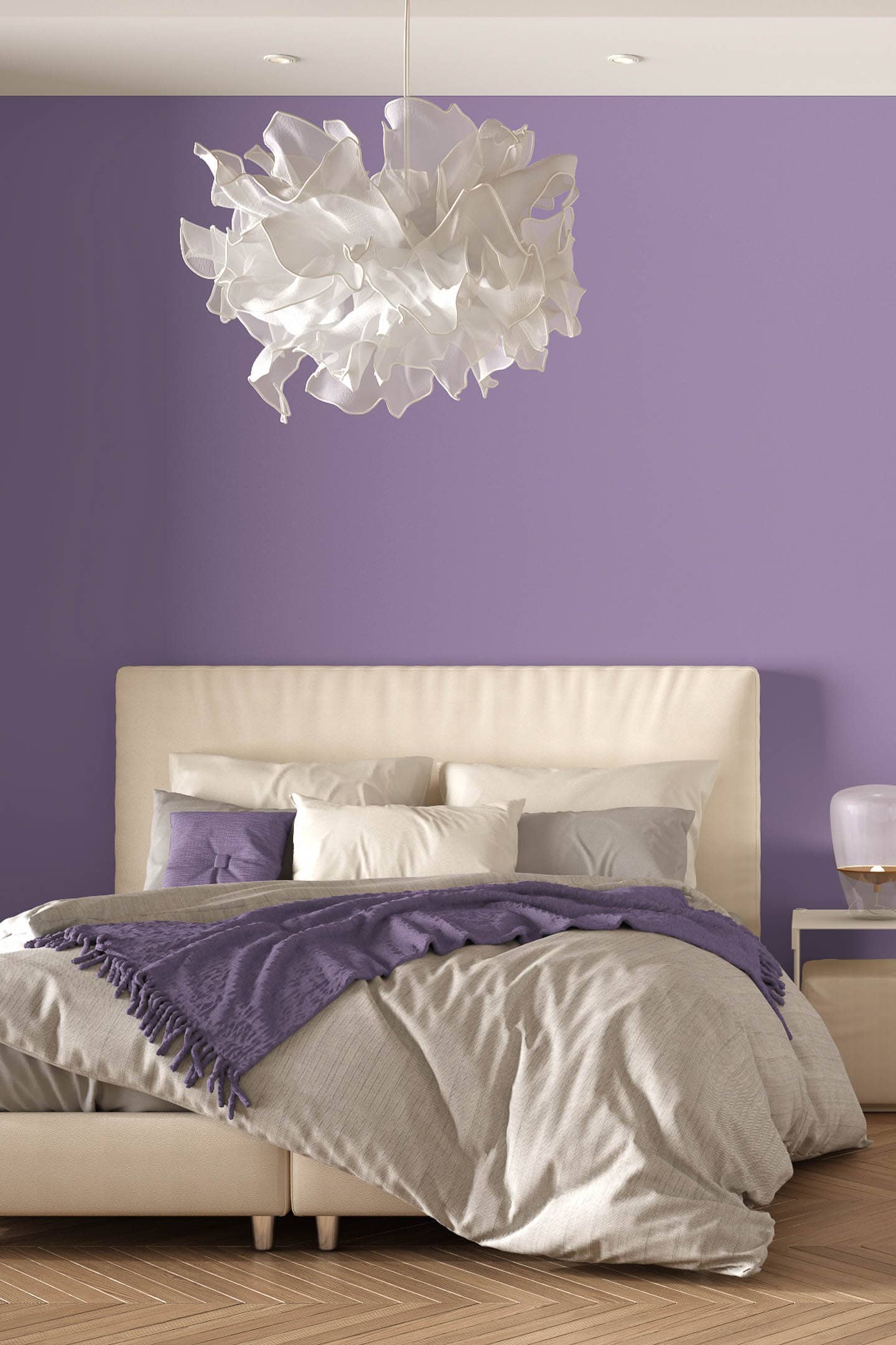 bedroom with lilac walls, cream furniture and a large white ceiling light fixture