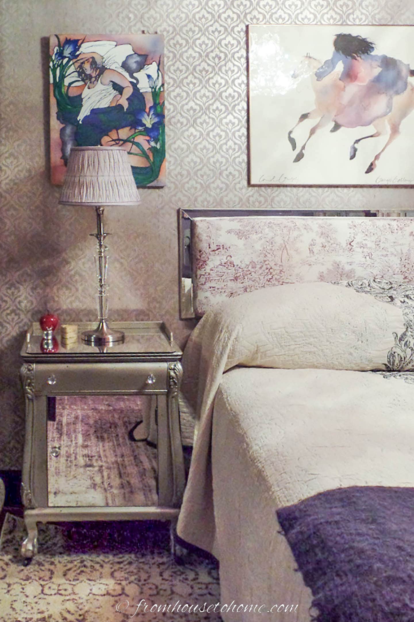 bedroom with mauve wallpaper and headboard