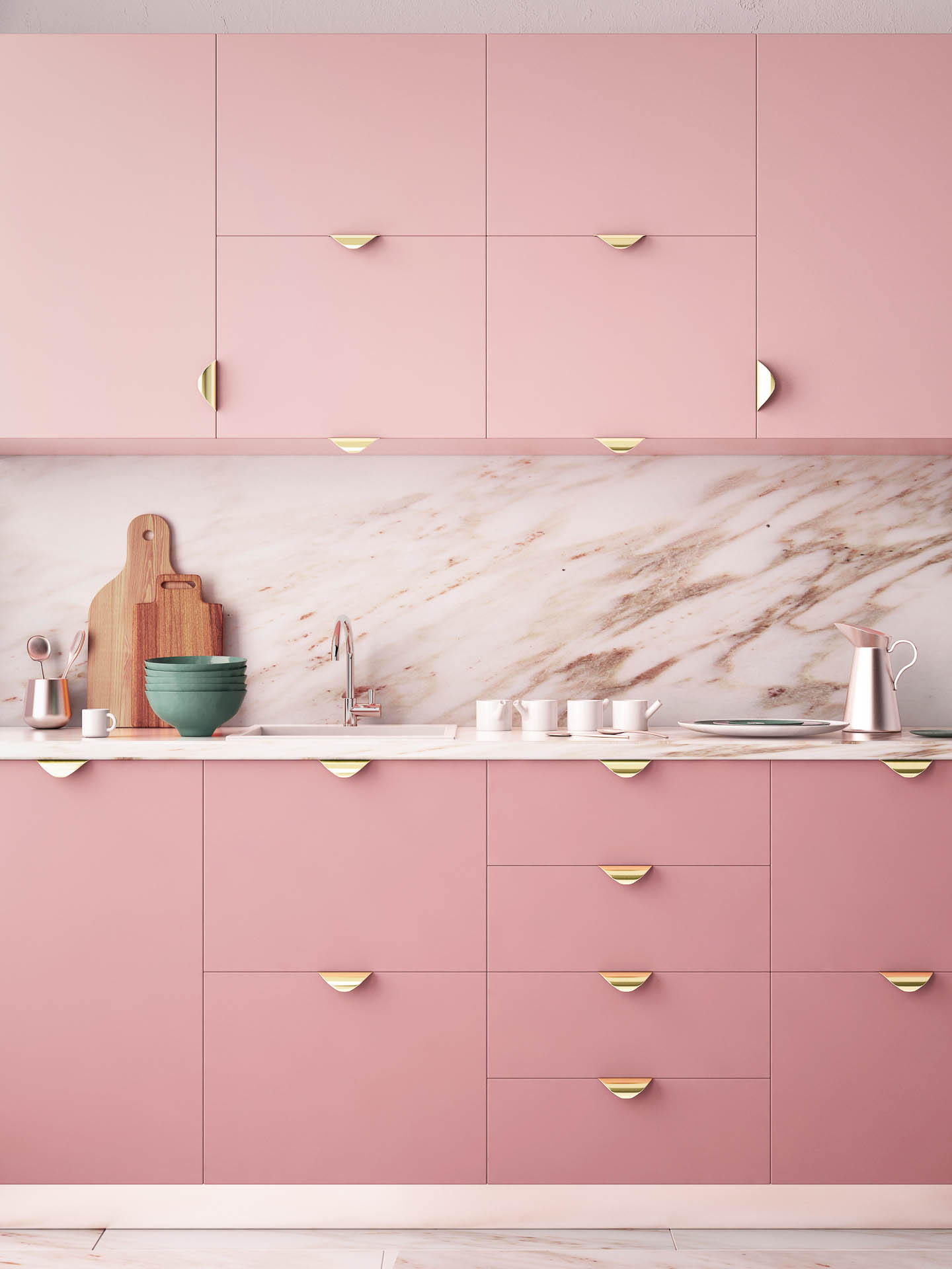 Kitchen with light pink upper cabinets, darker pink lower cabinets, gold hardware and marble countertops and backsplash