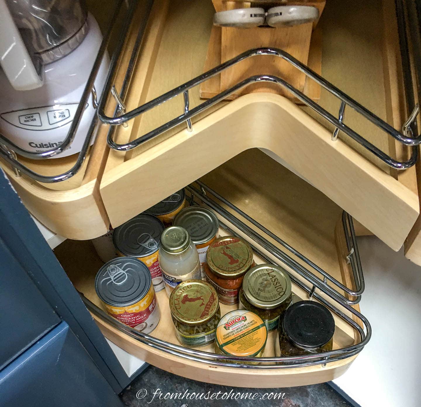 Corner cabinet lazy Susan with cans stored in it