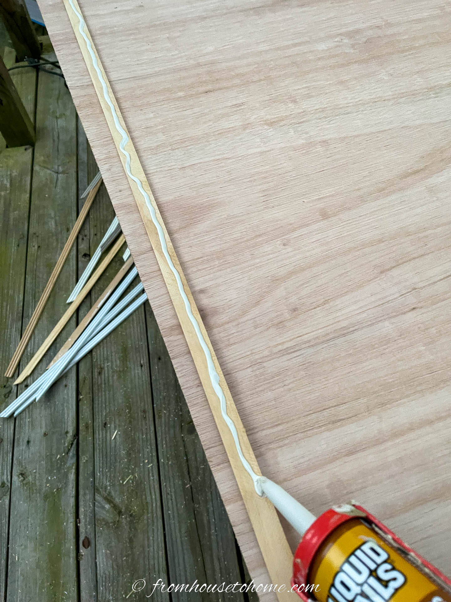 Glue on the back of the frame molding
