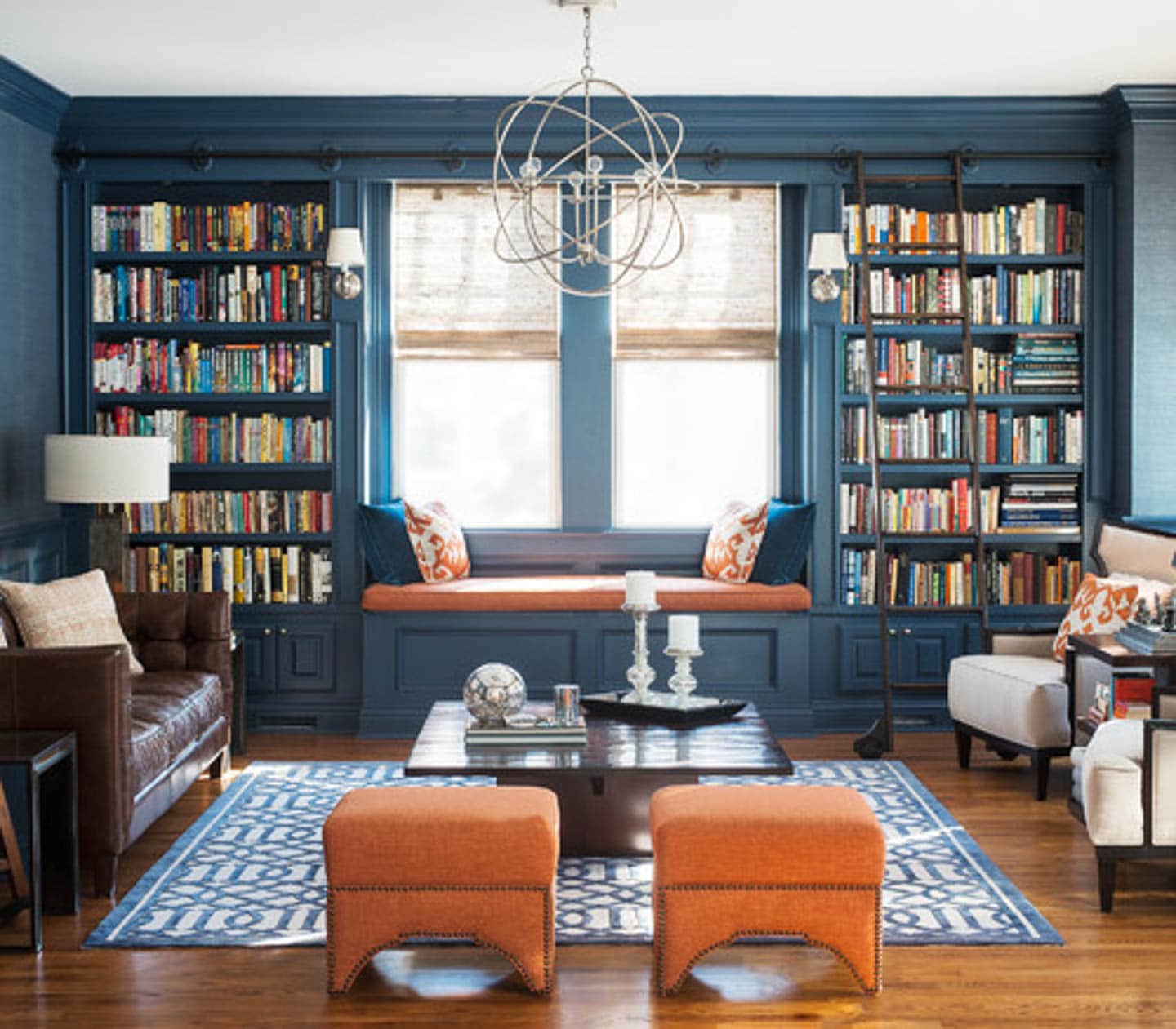 Library with walls and bookcases painted in Benjamin Moore Newburyport Blue