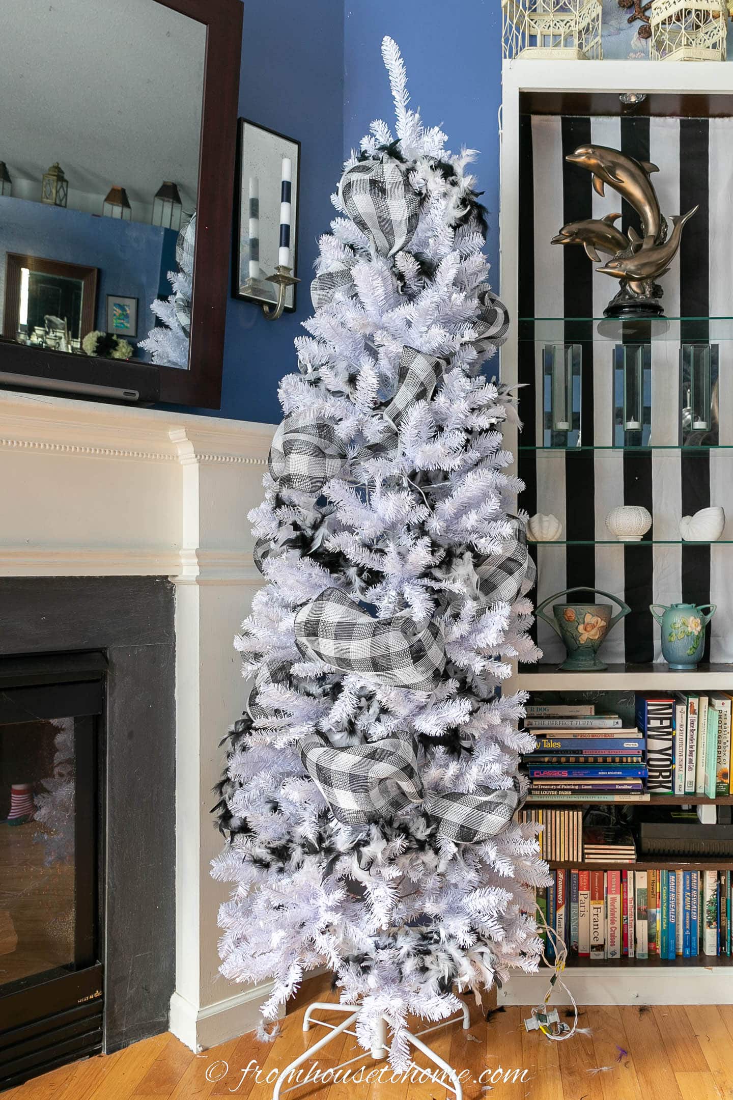 White Christmas tree with feather boas and black and white plaid deco mesh