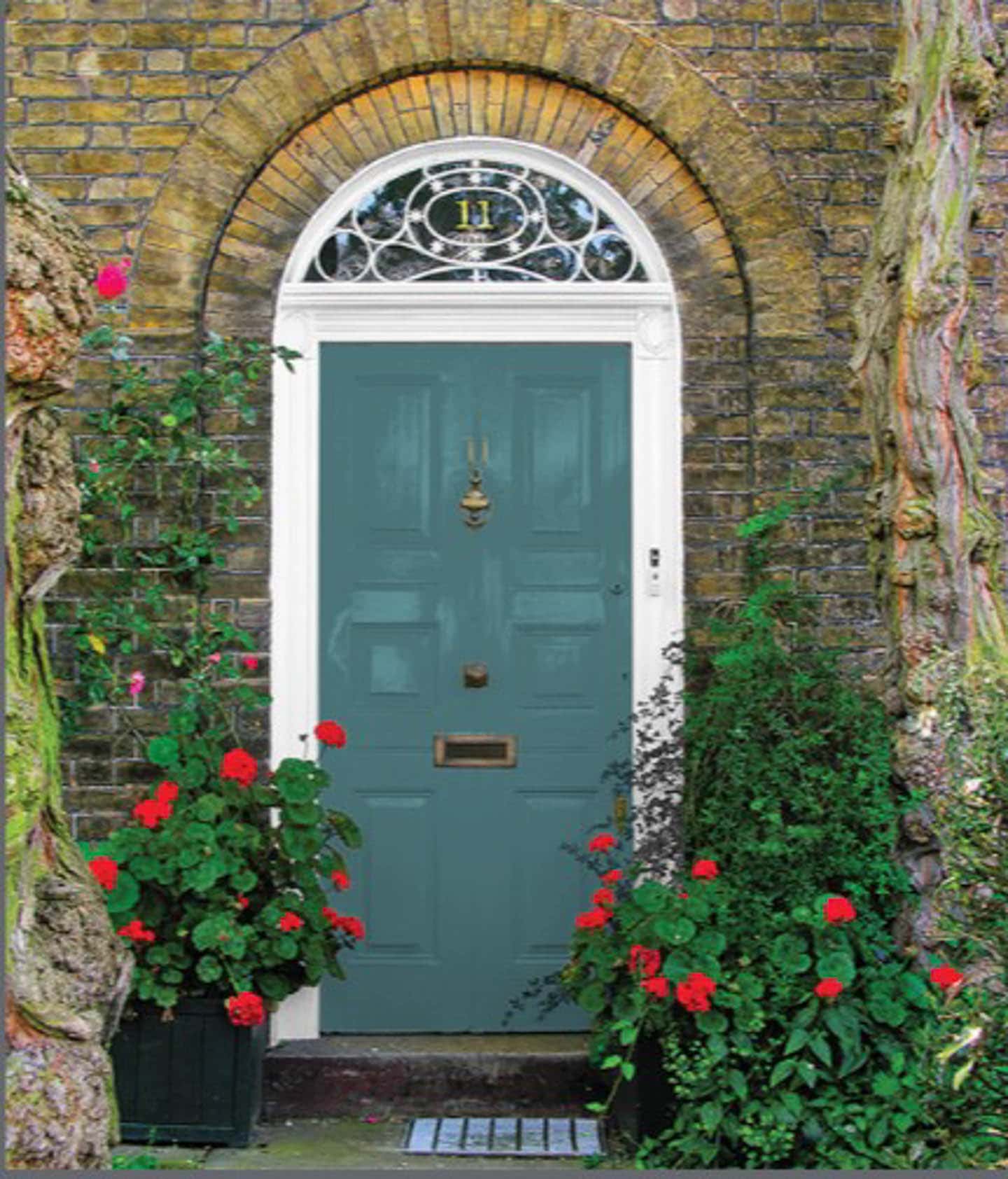 A front door painted with PPG's Vining Ivy