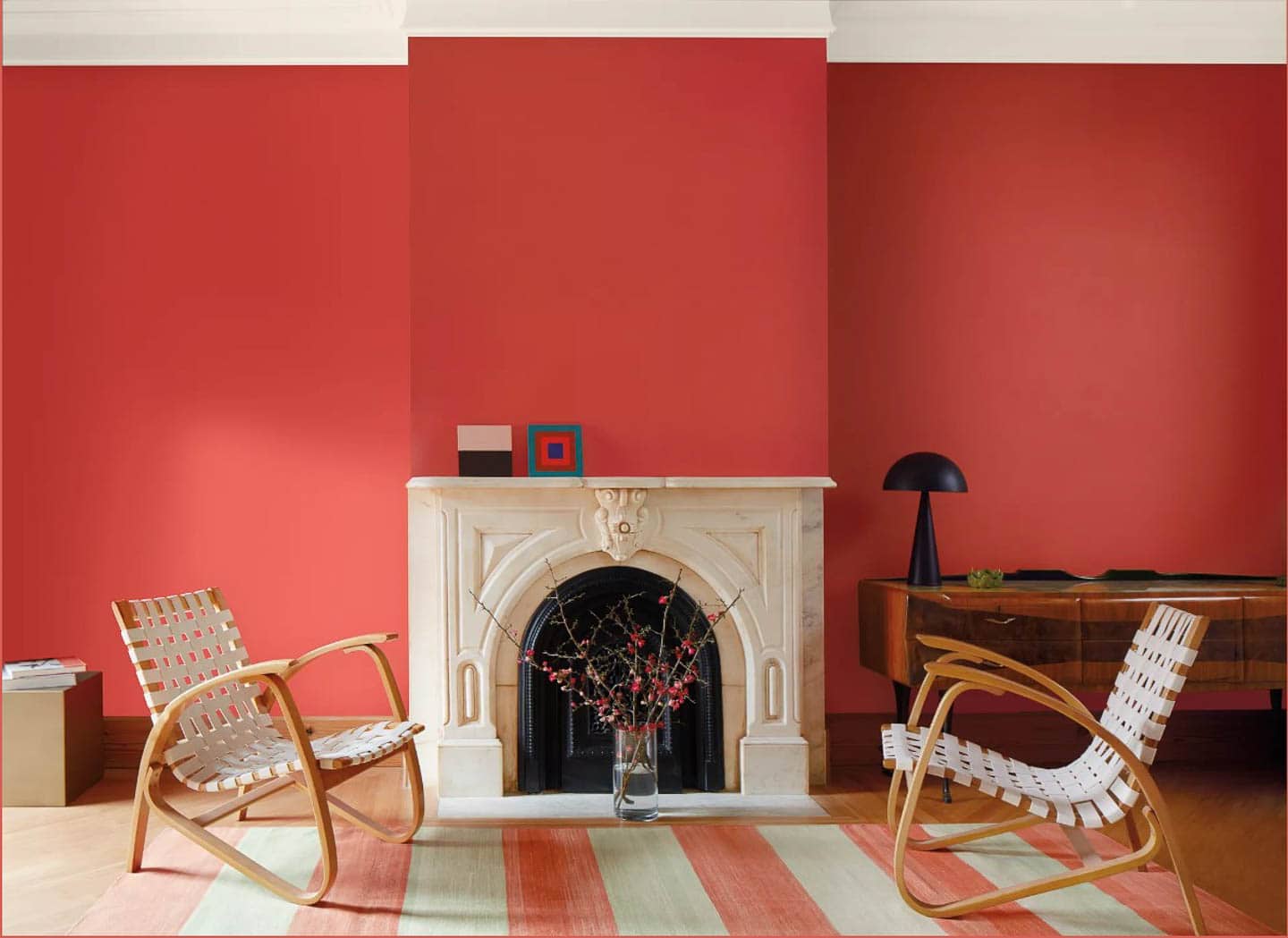Living room painted Benjamin Moore 'Raspberry Blush" with off white accents