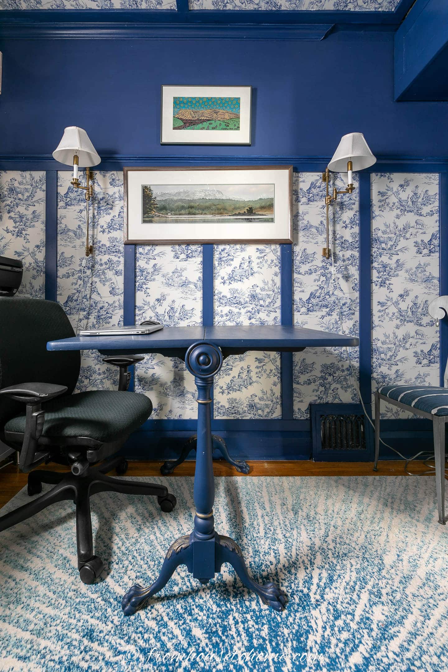 Blu drop leaf table in a small home office with board and batten blue and white walls