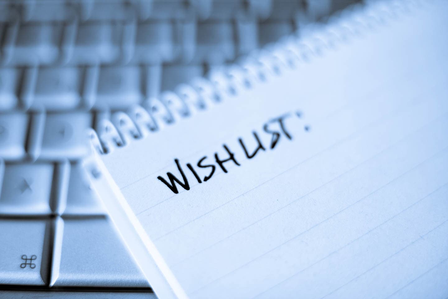 Wishlist printed on a pad of paper