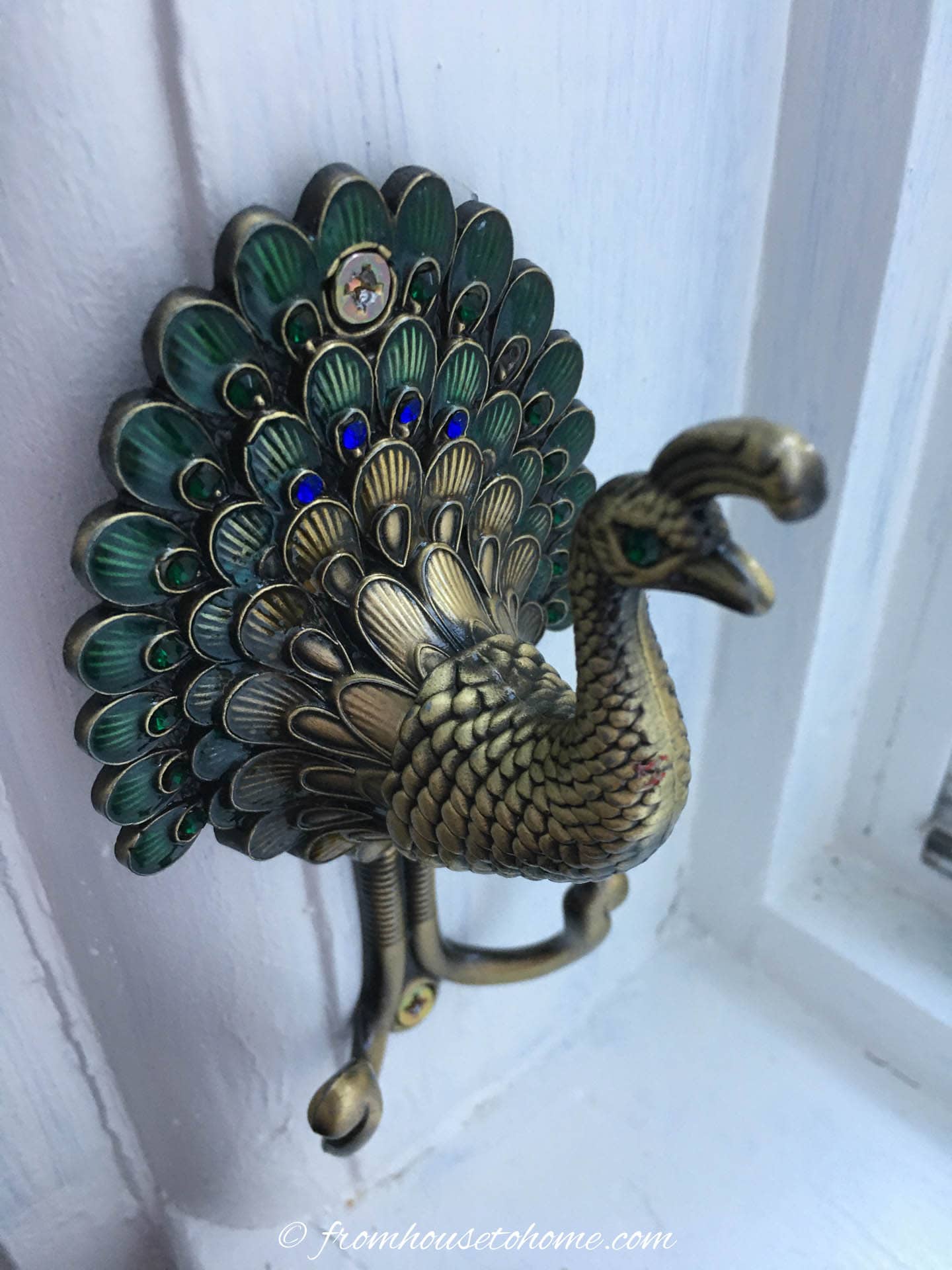 peacock curtain holder