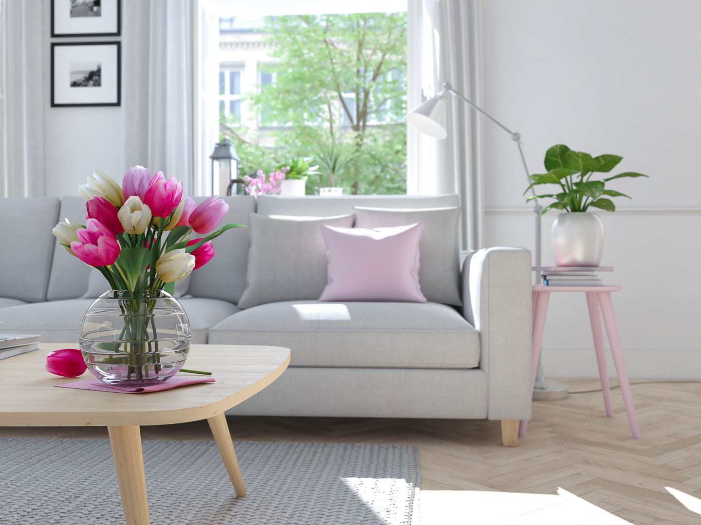 A gray living room with pink accents