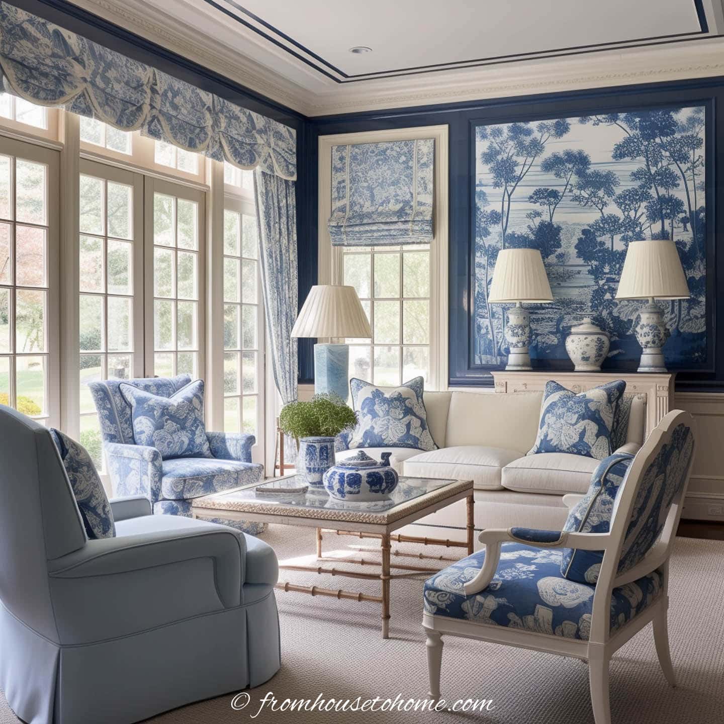 a blue and white living room with lots of pattern and color