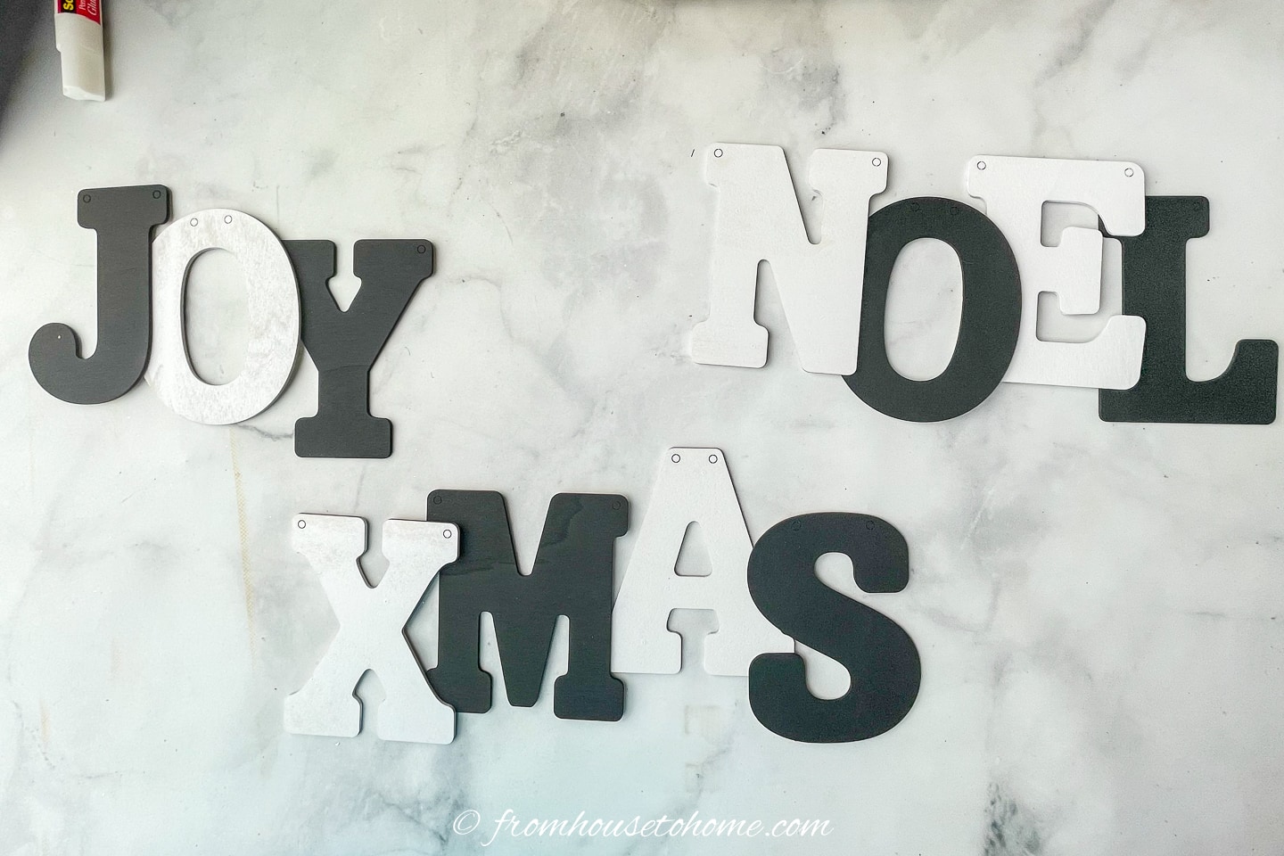 DIY letters arranged on a marble counter