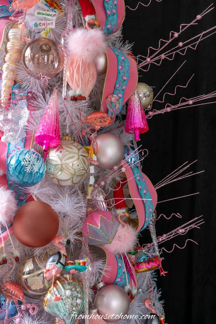 A flamingo Christmas tree decorated with pink ornaments.