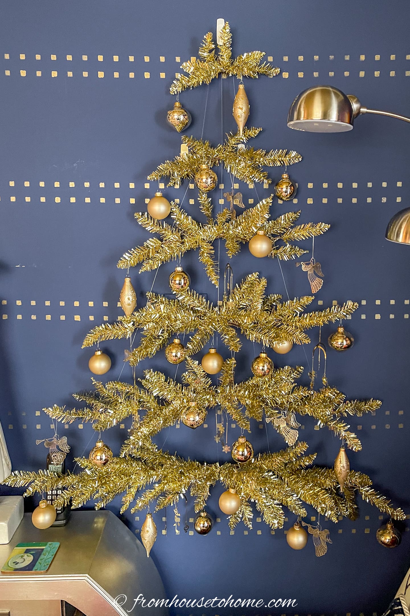 wall hanging Christmas tree with monochromatic decorations