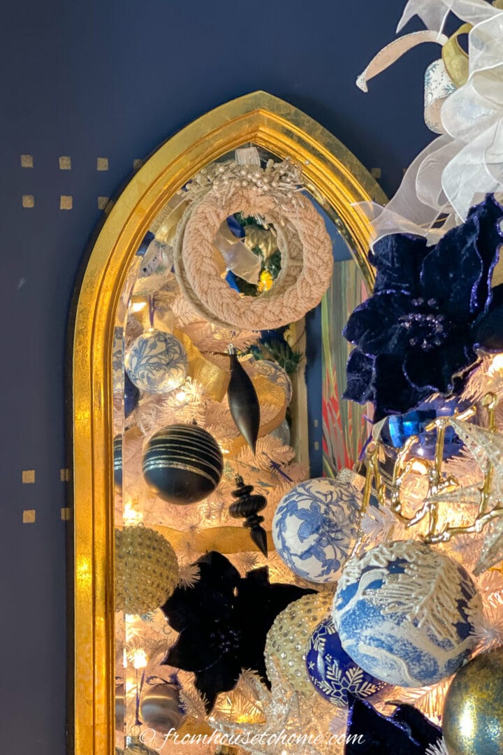 Mirror with a Christmas wreath hung on it