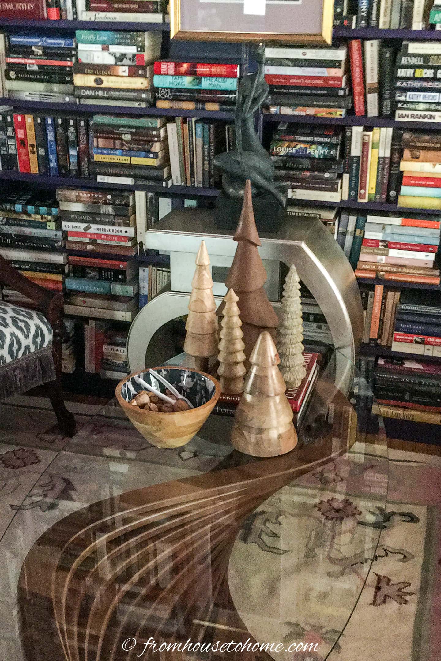 Wood mini trees on a coffee table in a small room