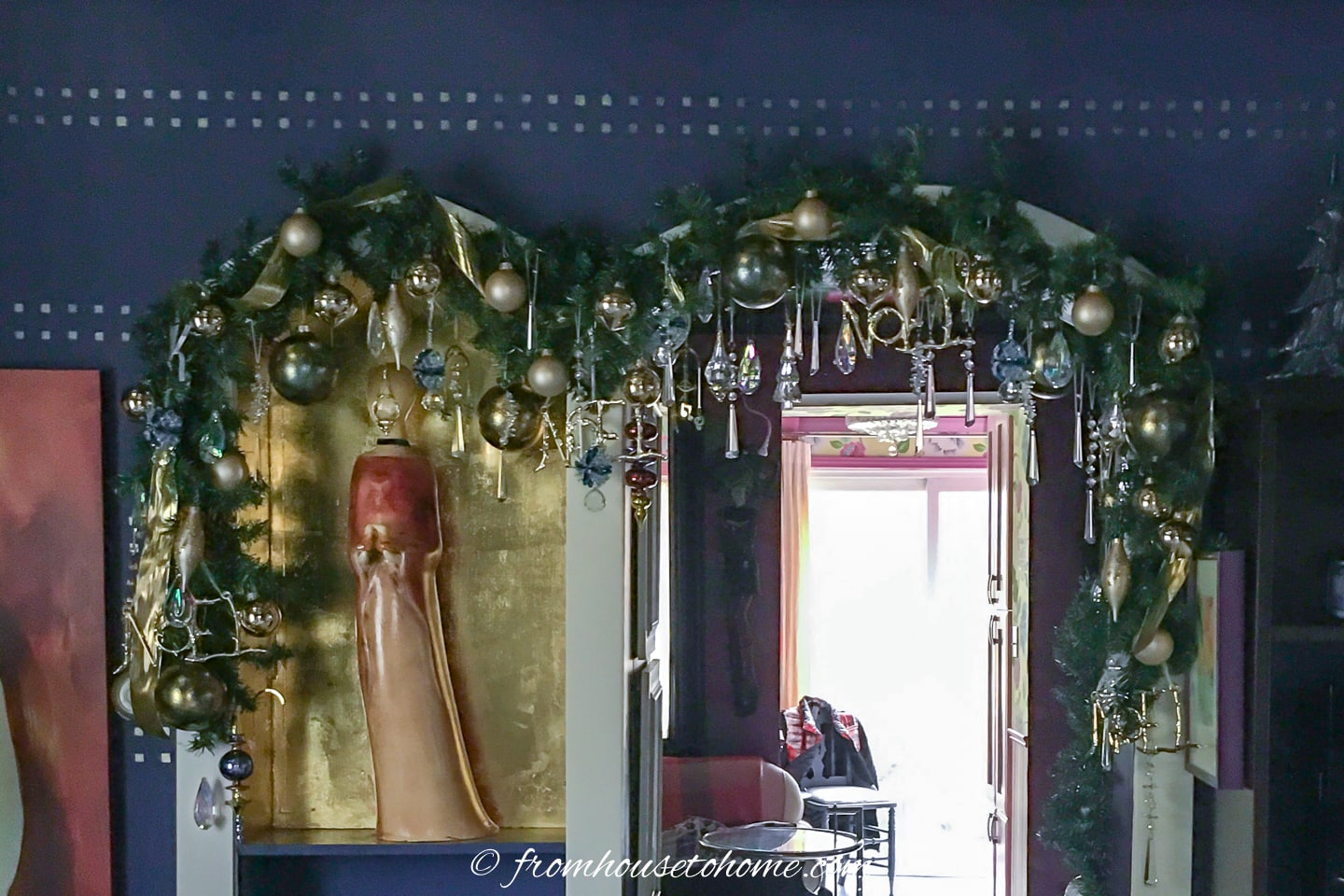 Indoor archway Christmas garland decorated with gold and crystal ornaments