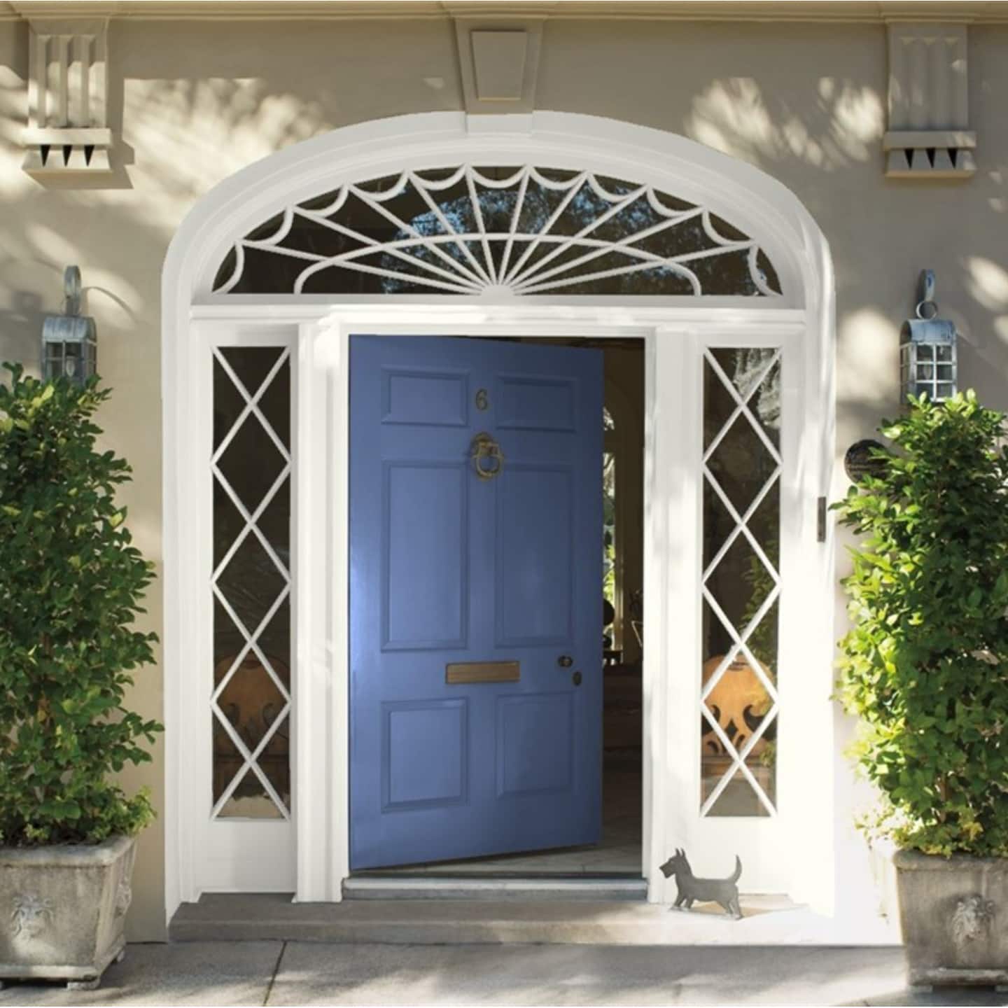 A front door painted in Benjamin Moore Blue Nova