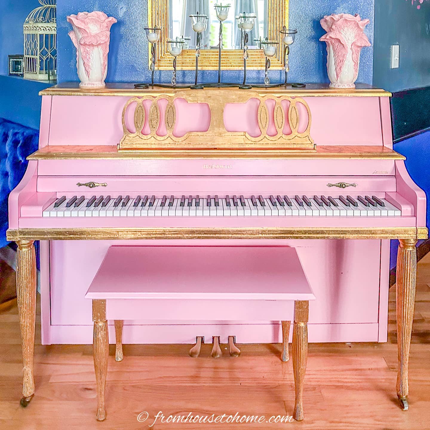 The piano painted pink with gold leaf accents