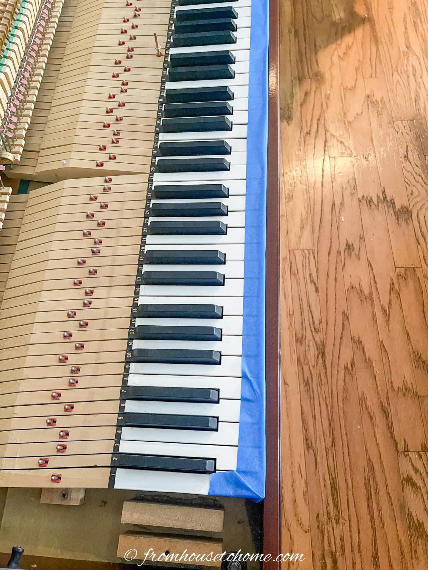 piano keys taped with painter's tape