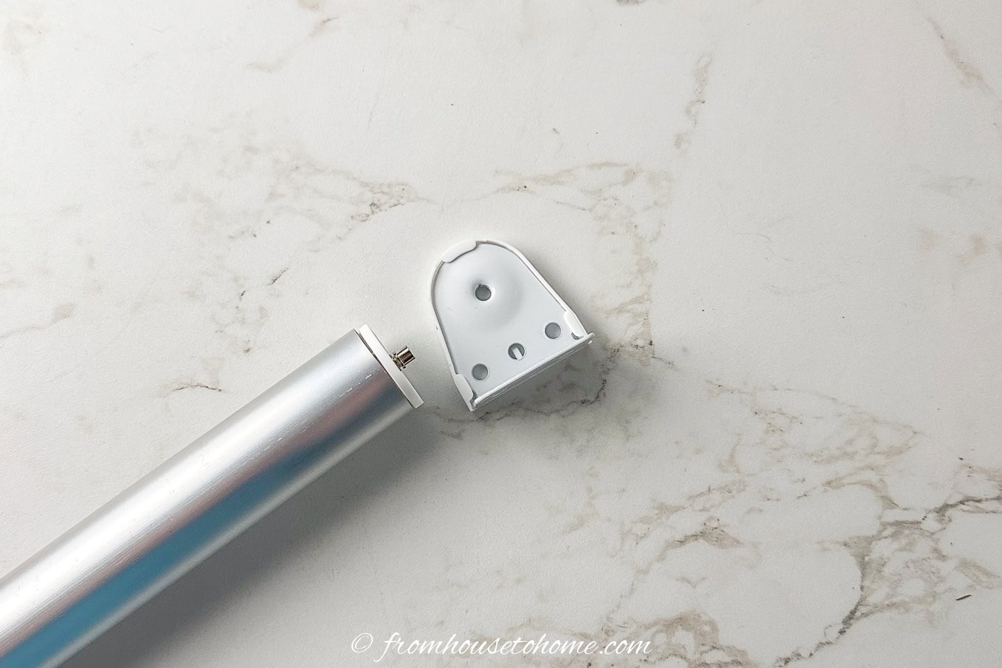 One end of a roller and bracket